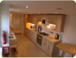 Fully fitted maple units and integrated appliances