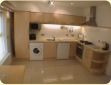 Fitted maple units, integrated appliances